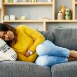 Woman with leaky gut feeling depressed and anxious